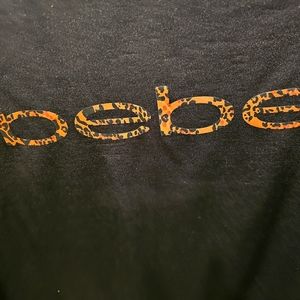 Bebe short-sleeved sports light-weight sports shirt.